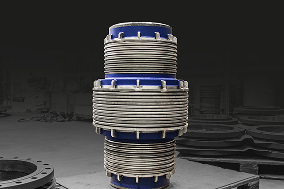 Pressure balanced expansion joint with ring reinforcement