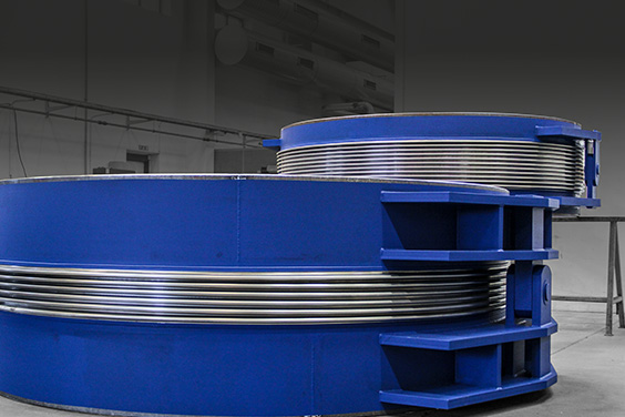 Hinged angular expansion bellows