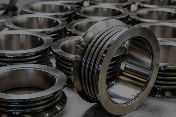 What are the advantages of using expansion bellows